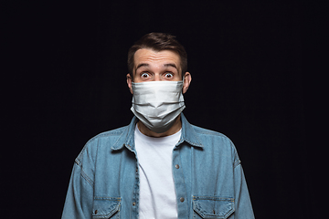 Image showing Man in protective mask, coronavirus prevention, protection concept