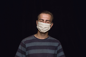 Image showing Man in protective mask, coronavirus prevention, protection concept