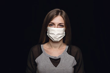 Image showing Woman in protective mask, coronavirus prevention, protection concept