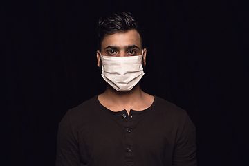 Image showing Man in protective mask, coronavirus prevention, protection concept