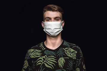 Image showing Man in protective mask, coronavirus prevention, protection concept