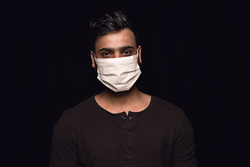 Image showing Man in protective mask, coronavirus prevention, protection concept