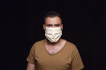 Image showing Man in protective mask, coronavirus prevention, protection concept