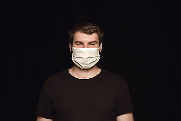 Image showing Man in protective mask, coronavirus prevention, protection concept