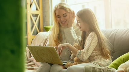 Image showing Happy loving family, mother and daughter spending time together at home