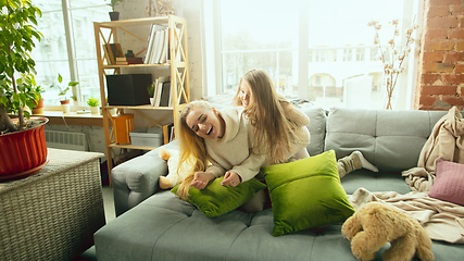 Image showing Happy loving family, mother and daughter spending time together at home