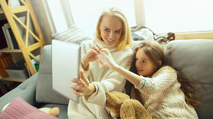 Image showing Happy loving family, mother and daughter spending time together at home