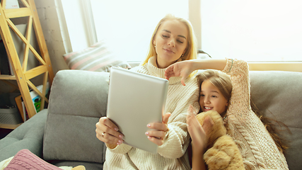 Image showing Happy loving family, mother and daughter spending time together at home