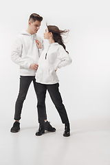 Image showing Trendy fashionable couple isolated on white studio background