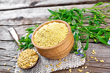 Image showing Bran flaxseed in bowl on board