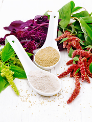 Image showing Flour and seeds amaranth in spoons on light board