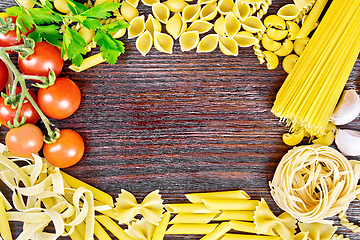 Image showing Frame of pasta on brown board