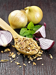 Image showing Onion flakes in spoon on table