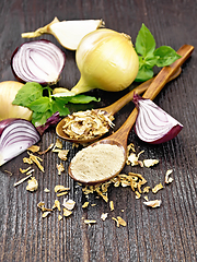 Image showing Onion powder and flakes in spoons on wooden board