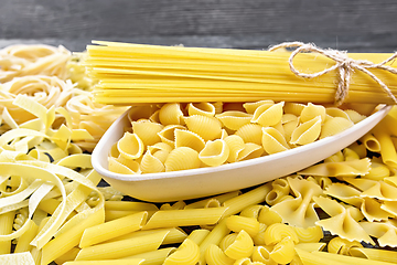 Image showing Pasta different with bowl on wooden board