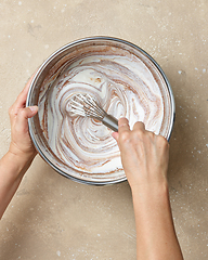 Image showing chocolate cake dough making process