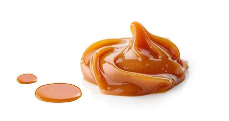 Image showing melted caramel on white background