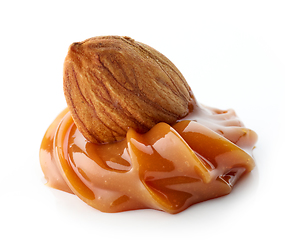 Image showing almond in melted caramel