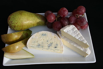 Image showing Plate with cheese, pears and grapes