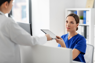 Image showing doctor and nurse with tablet computer at hospital