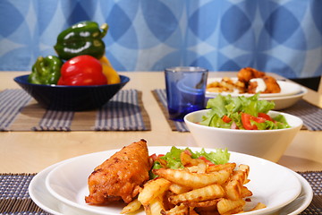 Image showing French fries and chicken