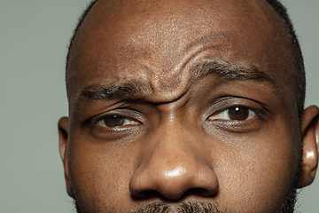 Image showing Close up of face of beautiful african-american young man, focus on eyes