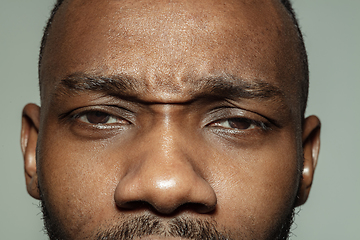 Image showing Close up of face of beautiful african-american young man, focus on eyes