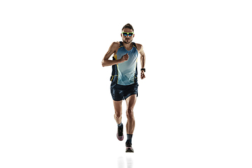 Image showing Triathlon male athlete running isolated on white studio background