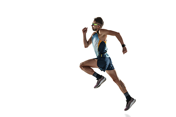 Image showing Triathlon male athlete running isolated on white studio background