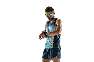 Image showing Triathlon male athlete running isolated on white studio background