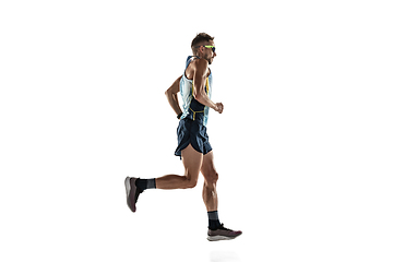 Image showing Triathlon male athlete running isolated on white studio background