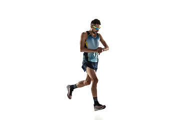 Image showing Triathlon male athlete running isolated on white studio background