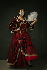 Image showing Medieval young woman as a duchess wearing protective mask against coronavirus spread