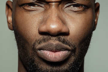 Image showing Close up of face of beautiful african-american young man, focus on mouth