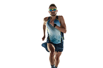 Image showing Triathlon male athlete running isolated on white studio background