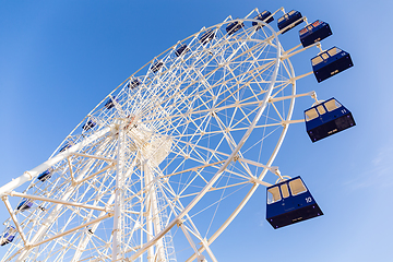 Image showing Ferris wheel and sunny blue