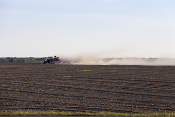 Image showing processing field tractor