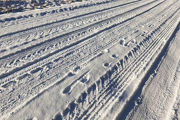 Image showing traces of the car on the road