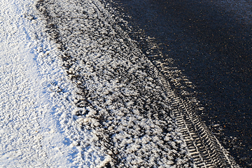 Image showing Asphalt road under the snow