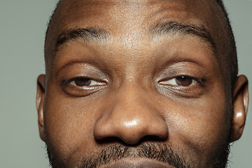 Image showing Close up of face of beautiful african-american young man, focus on eyes