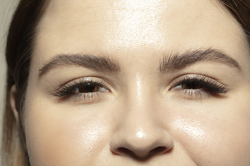 Image showing Close up of face of beautiful caucasian young woman, focus on eyes