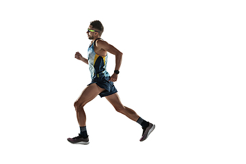 Image showing Triathlon male athlete running isolated on white studio background