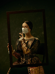 Image showing Medieval young woman as a duchess wearing protective mask against coronavirus spread