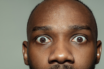 Image showing Close up of face of beautiful african-american young man, focus on eyes