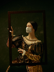 Image showing Medieval young woman as a duchess wearing protective mask against coronavirus spread