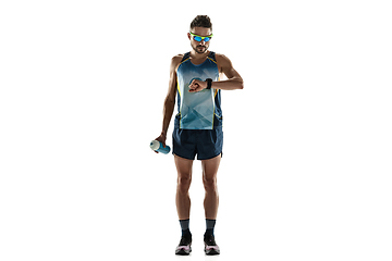 Image showing Triathlon male athlete running isolated on white studio background