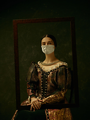 Image showing Medieval young woman as a duchess wearing protective mask against coronavirus spread