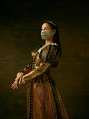 Image showing Medieval young woman as a duchess wearing protective mask against coronavirus spread