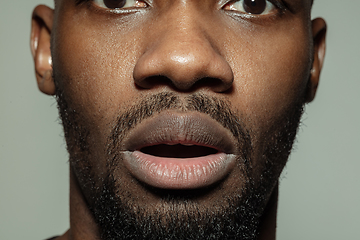 Image showing Close up of face of beautiful african-american young man, focus on mouth