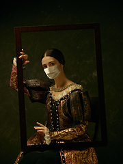Image showing Medieval young woman as a duchess wearing protective mask against coronavirus spread